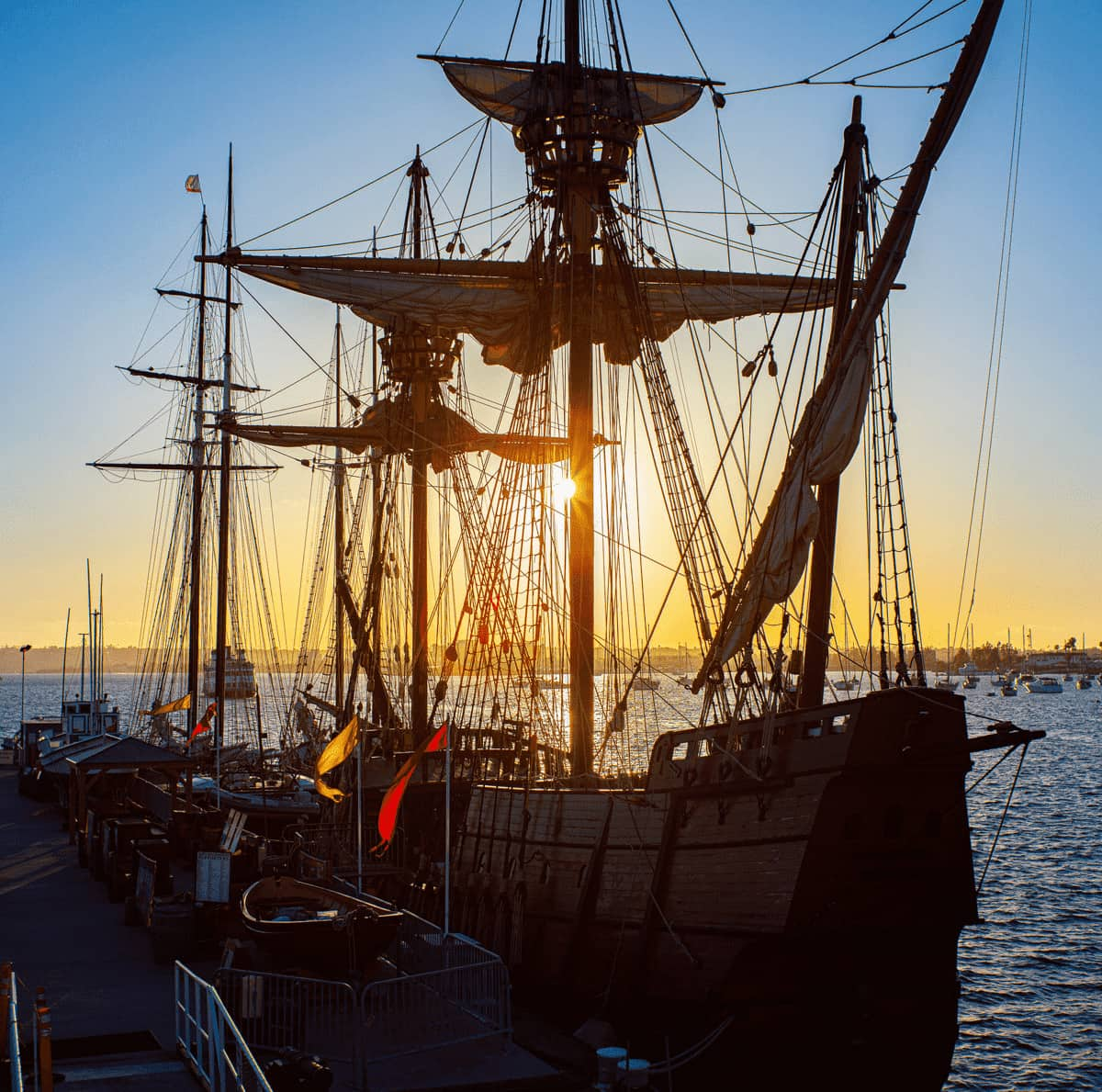 San Salvador sailing ship with a sunset in the backgroud.