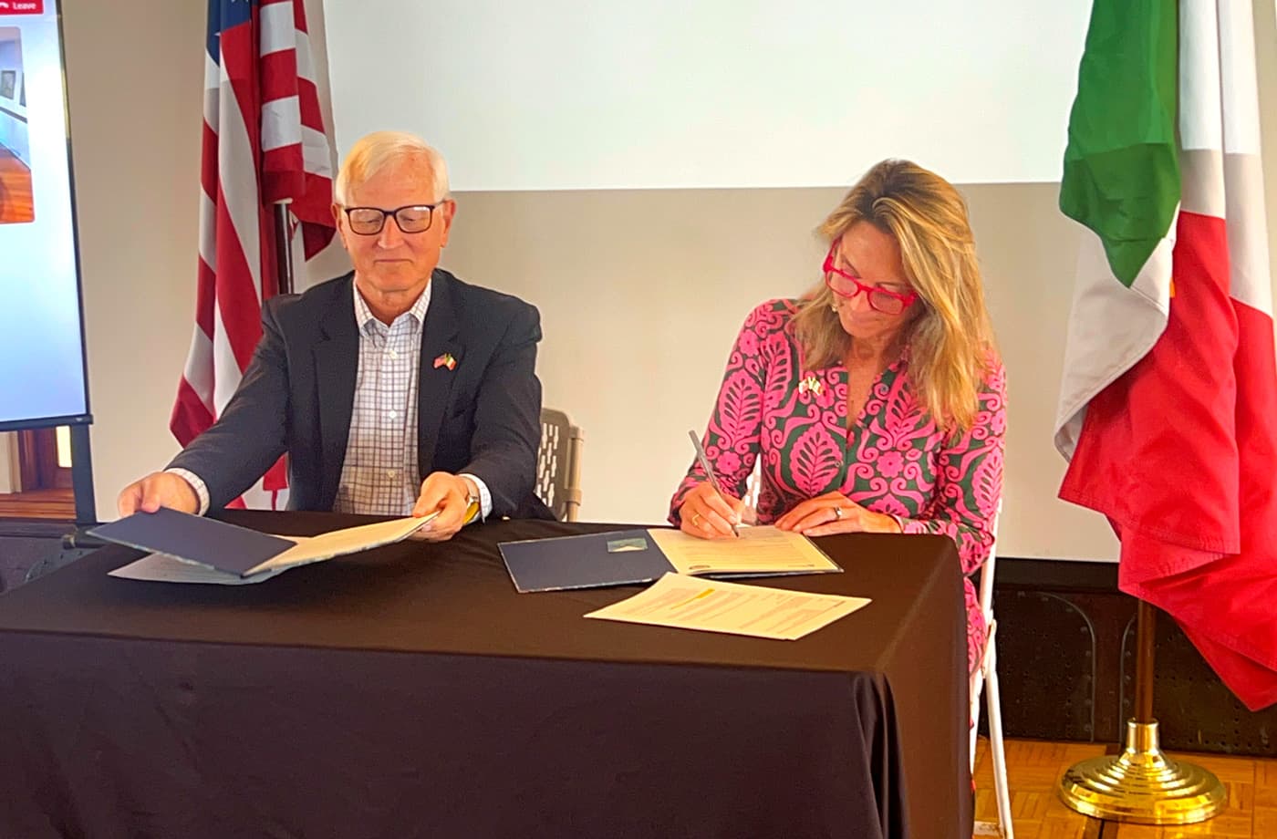 Ken Stipanov and President CEO Christina Connett Brophy PhD signing pact