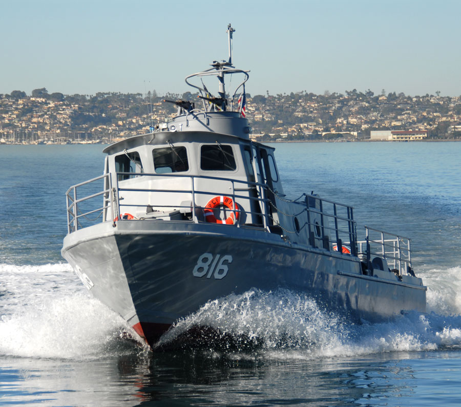 The Swift Boat PCF-816 cruising through San Diego Bay during a naval history tour.