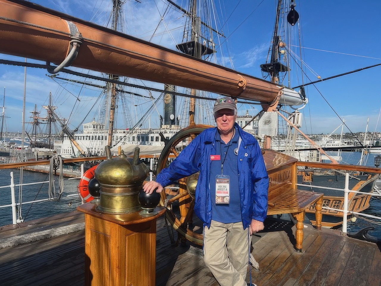 Docent standing at the helm compass of The Star of India