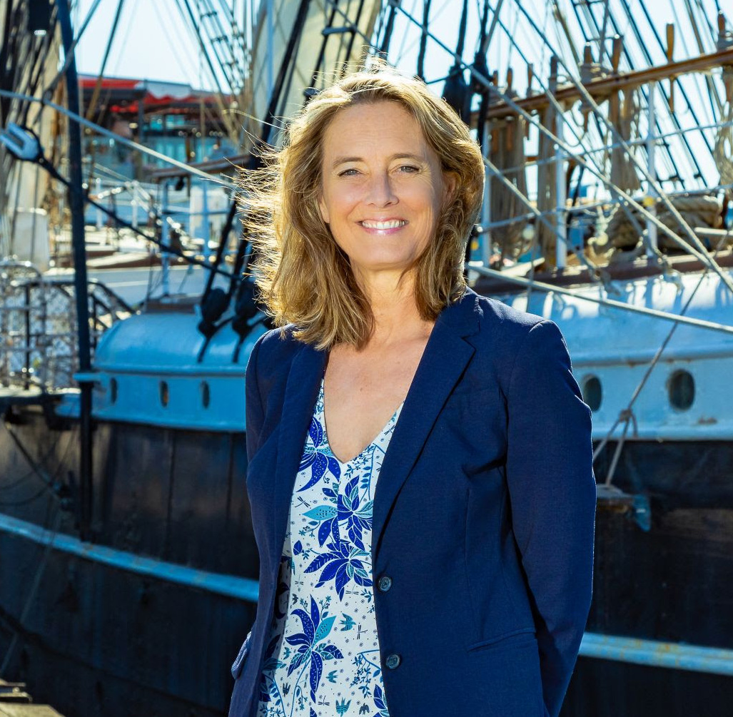 Christina Connett Brophy, PhD President & CEO Maritime Museum of San Diego Standing port side of Star of India