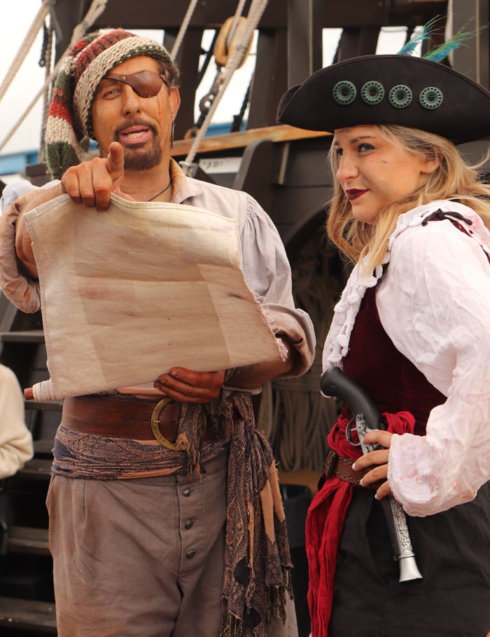 Boarded! A New Pirate Adventure, Pirates on San Salvador, looking at the treasure map.