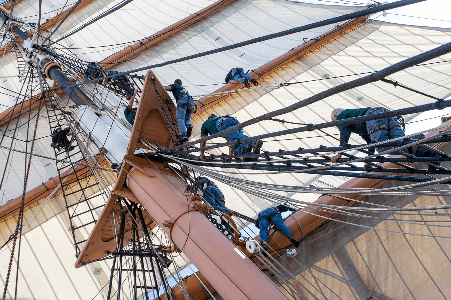 Sail crew climbing the mast of Star of India